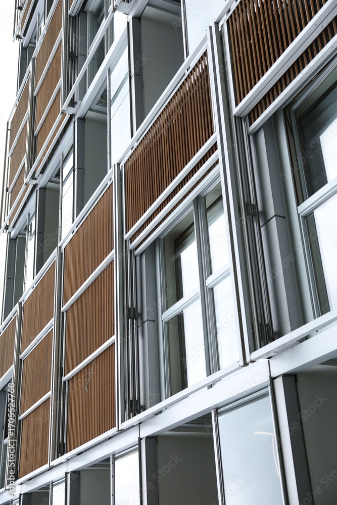 Fototapeta premium Modern apartment building exterior, low angle view