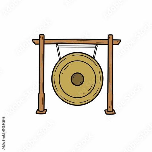 A large bronze gong hangs from a simple wooden frame.