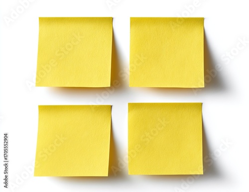 Four yellow sticky notes arranged in a grid pattern against a white background