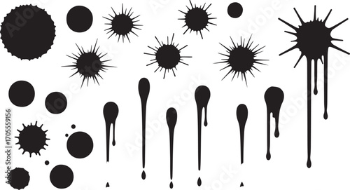 Set of black ink splatter stains isolated on white background