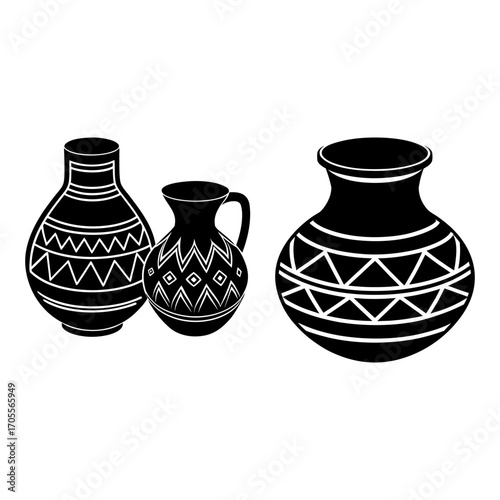 Three black and white vases with geometric patterns displayed in a simple and elegant arrangement style