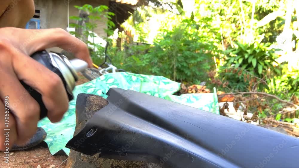 Refurbishing Old Motorcycle Body with Black Spray Paint