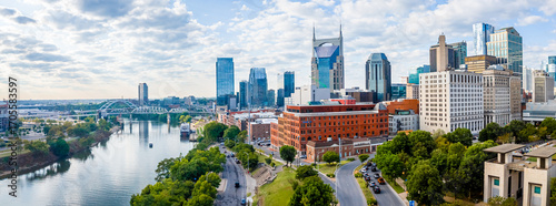 Nashville skyline at sunrise with river and modern skyscrapers