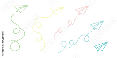 Set of handdrawn crayon paper airplane doodles. Simple and whimsical vector elements representing travel, communication, or childhood. Chalk drawing paper planes with curving flight path set.