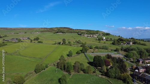 aerial scenic drone view of west yorkshire landscape with sandy gate road outside Hebden Bridge with Midgley moor in the distance