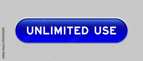Blue color capsule shape button with word unlimited use on gray background