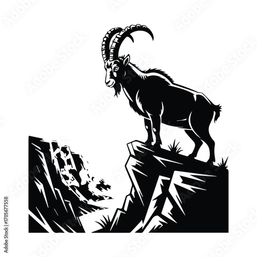 Silhouette of Majestic Ibex Standing on Rocky Cliff Edge with Mountain Vista