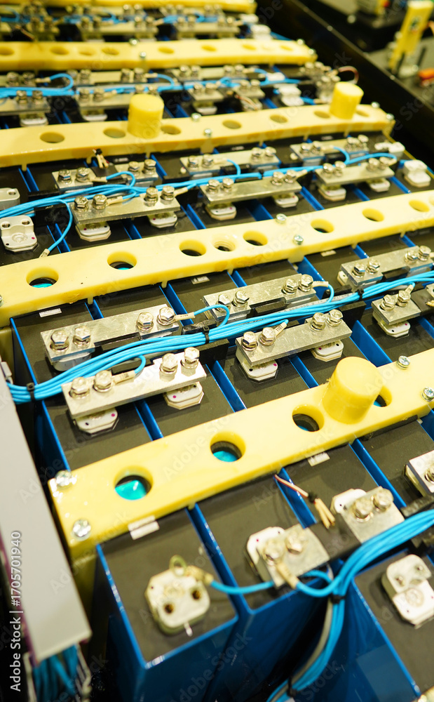 Fototapeta premium Electric vehicle battery for truck and , Lithium Iron Phosphate Batterys, EV technologies. Manufacturing of EV Lithium Battery pack. Lithium car battery on Production Line, Conveyor. Electric Car.