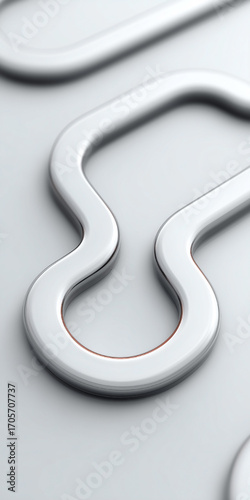 A silver object with a curved shape and a red line. The object is in a white background