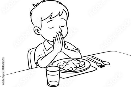 Young boy praying before meal, child giving thanks at dinner table, family values, religious gratitude, faith in daily routine, black and white