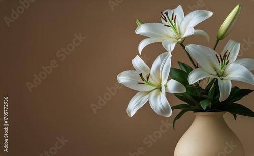 Elegant White Lilies Arranged in a Vase on a Wooden Table Against a Neutral B...