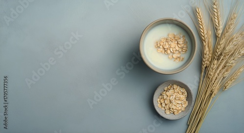 Breakfast Preparation With Oats and Milk on Blue Textured Surface