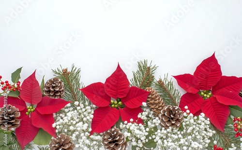 Festive Arrangement of Poinsettias, Pine Cones, and Greenery for Seasonal Cel...