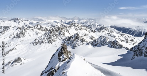 Mountain ridge of Piz Kesch, ascent on Piz Kesch or Piz d'Es-cha in winter, spectacular mountain landscape, view of mountain panorama with glacier Vadret da Porchabella, Albula Alps, Rhaetian Alps, Grisons, Eastern Switzerland, Switzerland