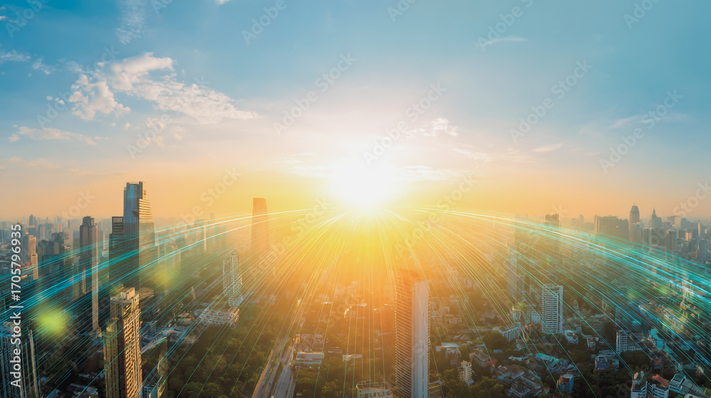 Fototapeta premium Sunshine in the Smart digital Innovation city with connection network reciprocity over the cityscape. of future smart wireless digital city and social media networking systems that connects people