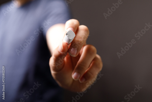 Close-up of a hand holding ...