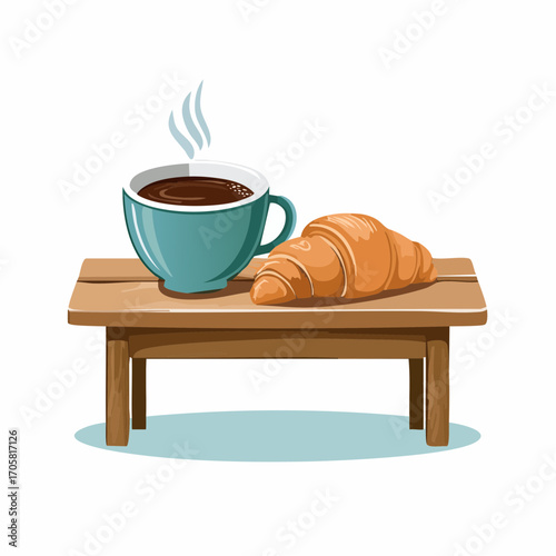 Kaffee und Croissant auf Tisch