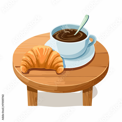 Kaffee und Croissant auf Tisch