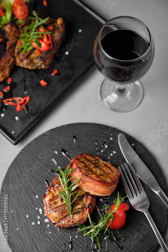 Gourmet meal with steak and red wine