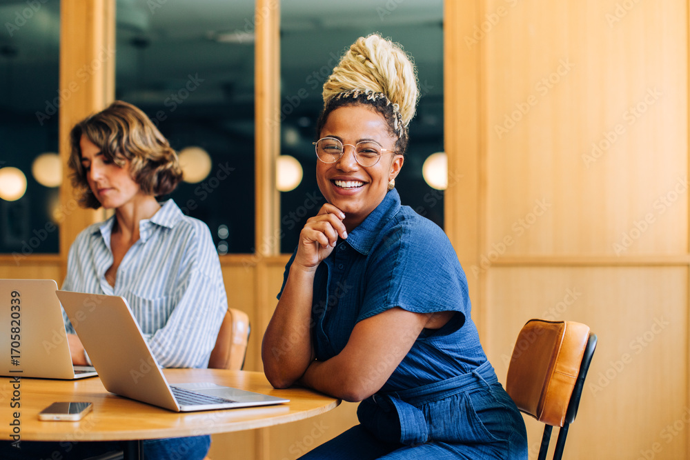 custom made wallpaper toronto digitalProfessional women working and smiling in a modern office setting