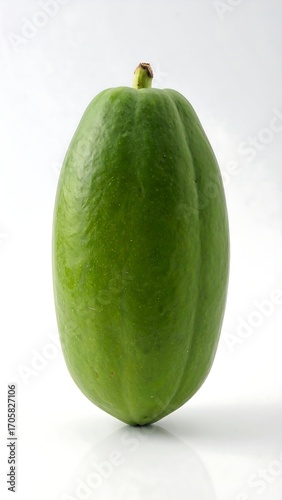 Close-up of a vibrant green papaya
