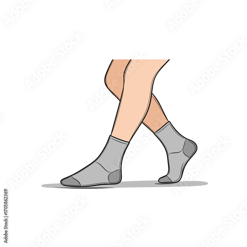 Pair of feet wearing gray socks walking