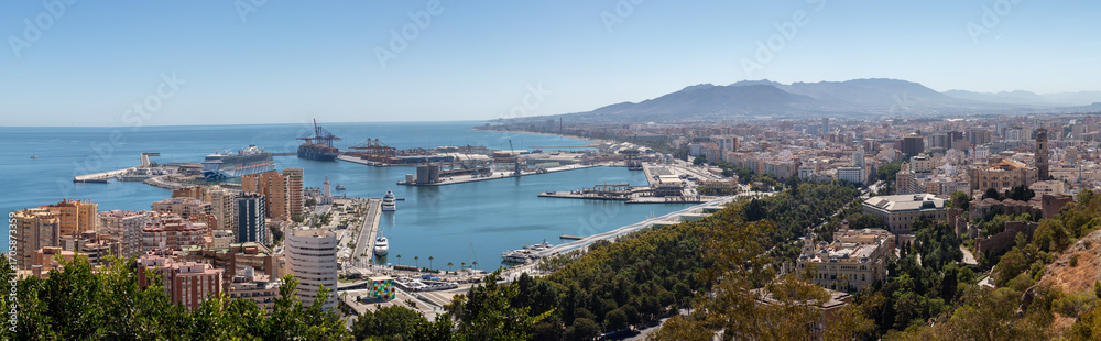 Fototapeta premium Malaga, Andalusia, Spain. 4 September 2025. View of Malaga city with bullring, port, and coastline