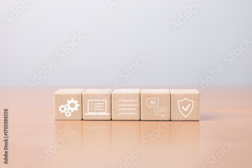 Wooden block with gear icons, checklist, artificial intelligence and shield symbolizing automation, technology, data security, systems management and modern digitalization.