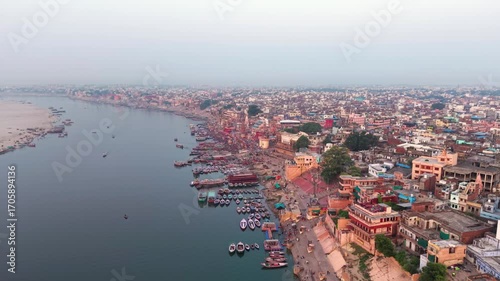 Varanasi, India: Aerial view of famous Dashashwamedh Ghat in ancient holy city on Ganges river - landscape panorama of Southeast Asia from above

