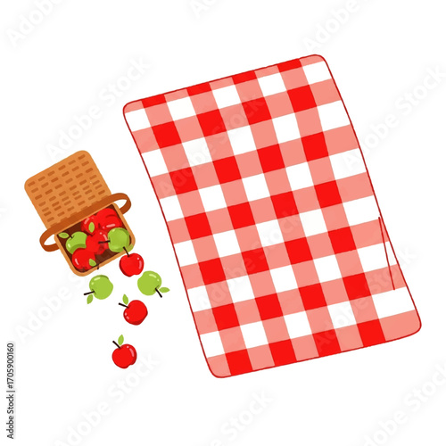 Picnic scene with a checkered blanket and a basket of apples spilling onto the ground.