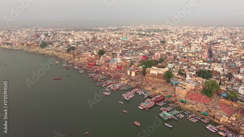 Varanasi, India: Aerial view of famous Dashashwamedh Ghat in ancient holy city on Ganges river - landscape panorama of Southeast Asia from above
