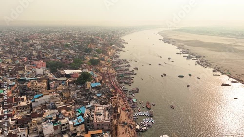 Varanasi, India: Aerial view of famous Dashashwamedh Ghat in ancient holy city on Ganges river - landscape panorama of Southeast Asia from above
