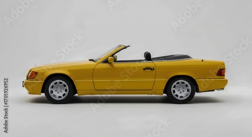 Luxury Yellow Convertible Car Isolated Against White Background Studio Shot