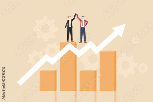 Two businessmen celebrating success on a rising bar graph with an upward arrow and gears in the background
