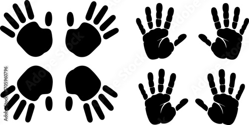 Black handprints and footprints on white background