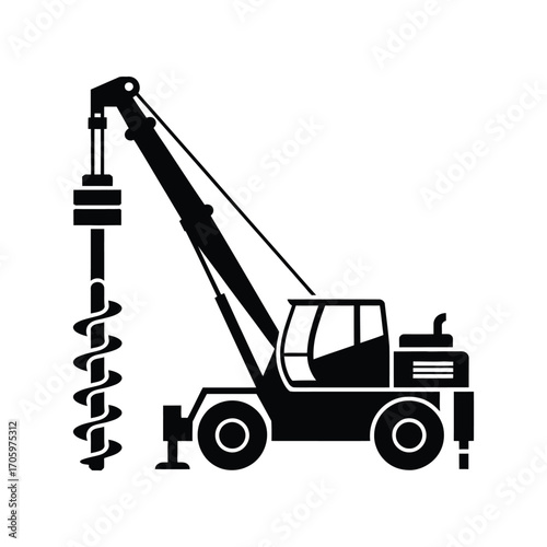 Silhouette of a drilling rig with a large auger attachment