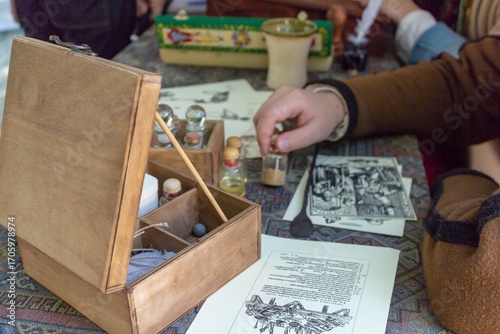 Εκτύπωση καμβά A medieval scribe working on illuminated manuscripts with ancient tools in a woo