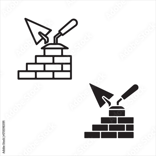 Icon of a trowel and brick wall construction in outline and solid styles