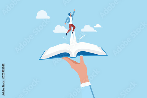 Person jumping from an open book held by a hand symbolizing knowledge and success