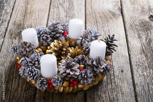 advent wreath candles on rustic old wooden table