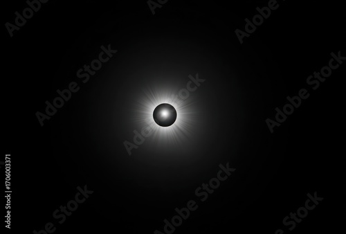 A dark orb, centrally placed, radiating a burst of light against a solid black background, evoking cosmic or minimalist feel