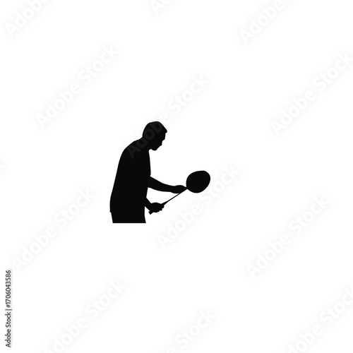 A dynamic silhouette of a badminton player in mid-action, showcasing the sport's athleticism.