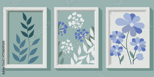 Three framed botanical prints featuring abstract floral and leaf designs in muted blue and green tones