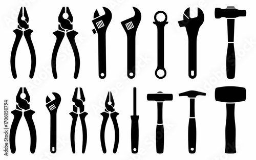 Vector art of set of black silhouette construction tools