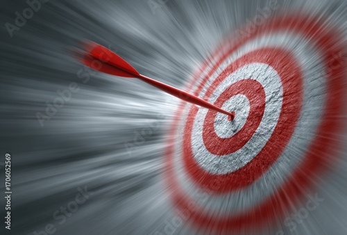Red arrow hitting the bullseye of a target with a radial blur effect creating a sense of speed and focus