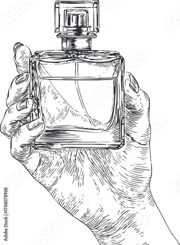 A hand holding an elegant glass perfume bottle showcasing beauty and fragrance.