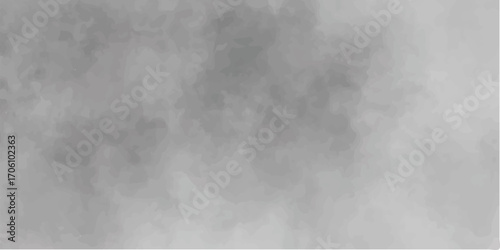 An abstract image of black and white smoke clouds on a dark sky	