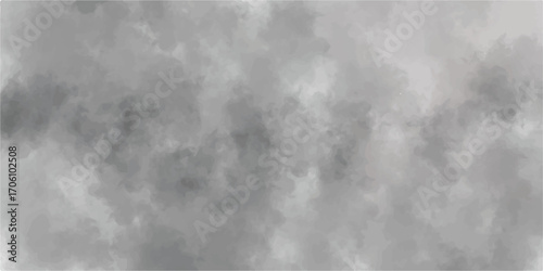 An abstract image of black and white smoke clouds on a dark sky	