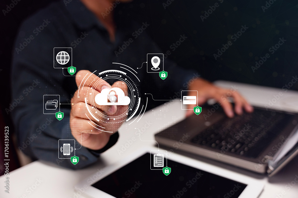 Fototapeta premium A person interacts with digital icons representing cloud computing and security, highlighting technology and data management concepts.