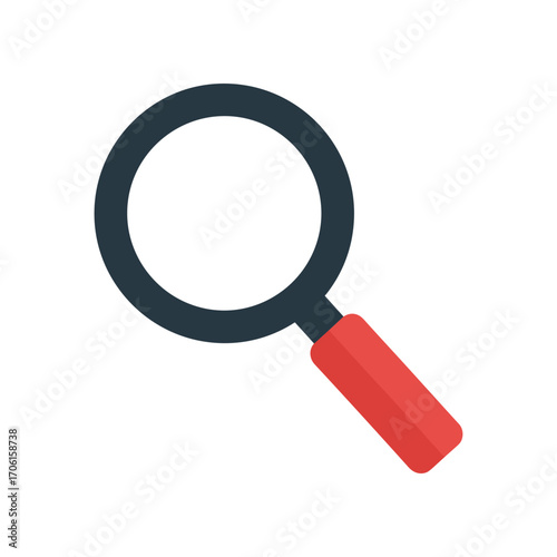 A close-up view of a magnifying glass resting on a wooden surface, highlighting its details